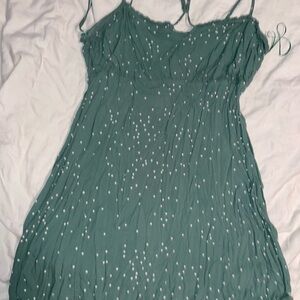Green polka dot mini dress